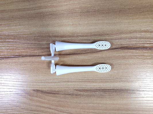 China Artículo COMO componentes plásticos del moldeo por inyección para procesar el cepillo de dientes fábrica